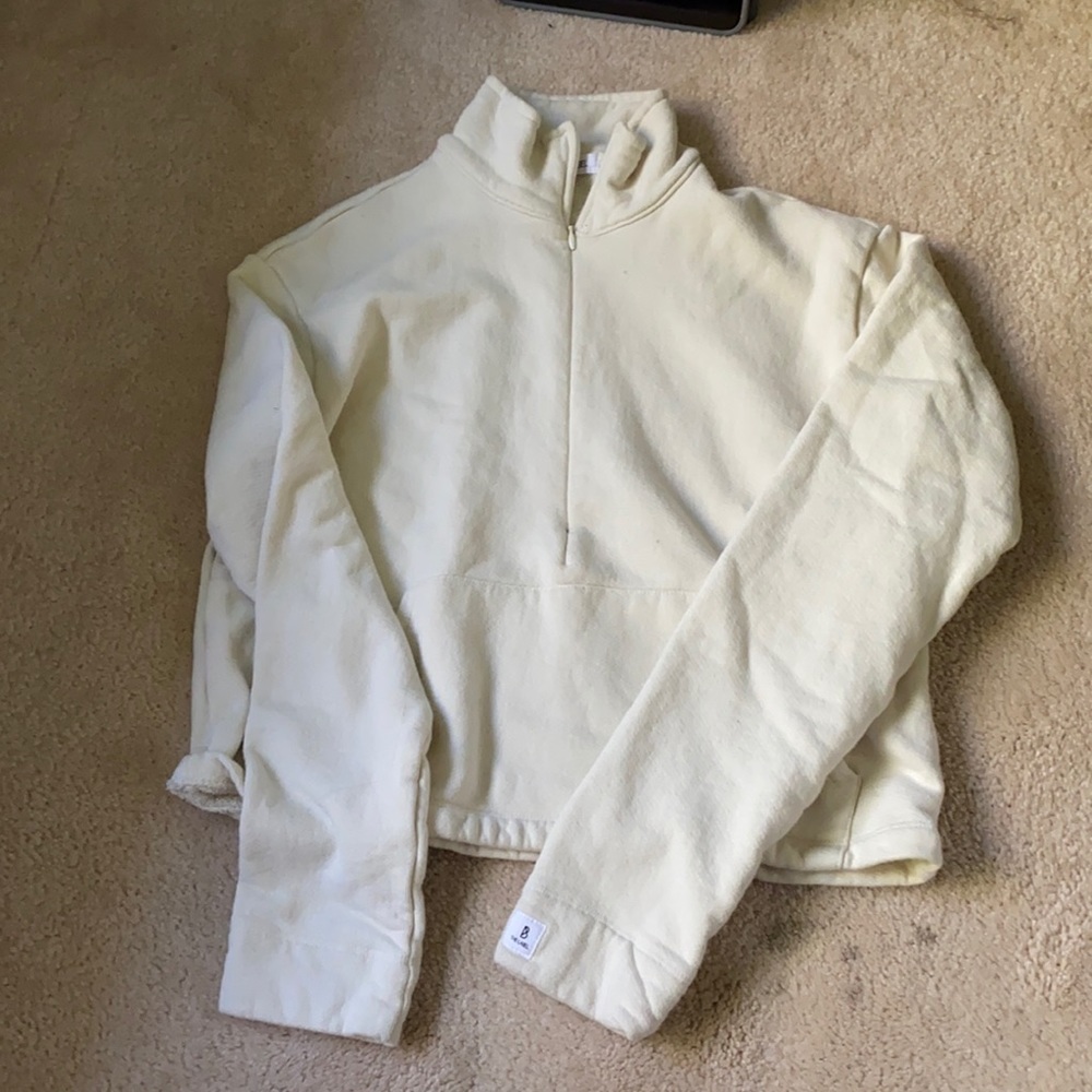 B the label: cream sweater with zipper